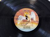 an image of a vinyl record with a picture of an angel on it