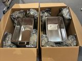 two boxes of food that are sitting on the floor