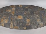 an image of a round table with a stone top