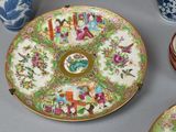 many plates and cups sitting on a table