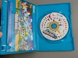 someone is holding a wii game in a blue case