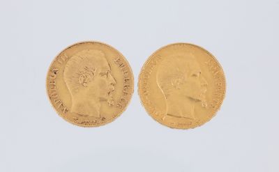 two gold sovereigns, one with the head of a man and one with a woman