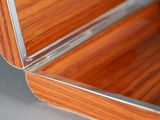 a close up of a wooden box on a table