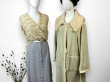 two mannequins dressed in different styles of clothing and hats