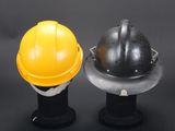 two helmets that are sitting on top of each other