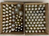 many bottles of wine in a box on the table