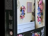 a box that has a picture of a room with flowers on it