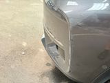 a close up of a car ' s front bumper