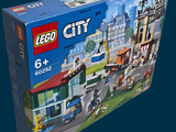 a box with a lego city set in it