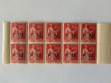 a close up of six stamps on a piece of paper