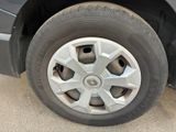 a close up of a tire on a car ' s rim