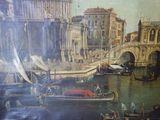 une photo d'un tableau représentant un canal avec des bateaux dessus