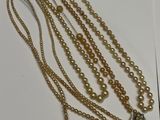 a close up of a bunch of pearls on a table