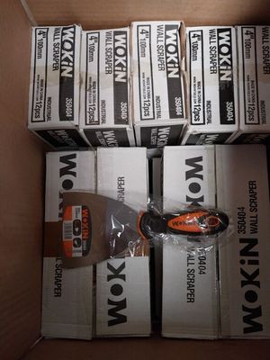 a lot of boxes of scissors in a cardboard box