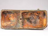 a bronze sculpture of a man and a woman in a boat