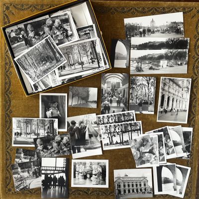 several black and white photos of people and buildings on a bulletin board