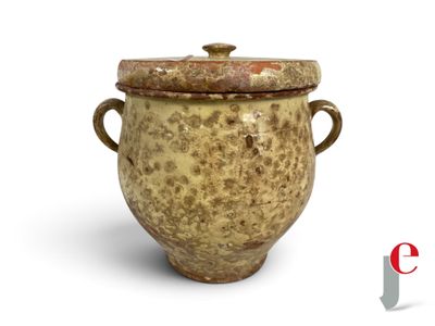 a brown vase with a lid on a white background