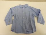 blue button up shirt with black cat embroidered on the chest