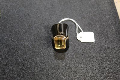 a small piece of jewelry that is on a table