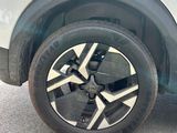 a close up of a tire on a car ' s rim
