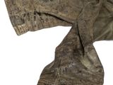 an old pair of brown leather pants on a white surface