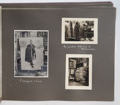 an old photo of a man standing in front of a refrigerator