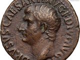 an ancient coin with a woman ' s face on it