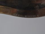 a close up of a metal object on a table