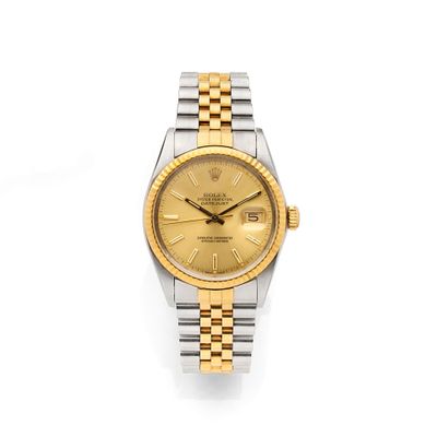 a close up of a watch on a white surface with a white background