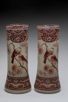 pair of chinese vases with birds and flowers on them