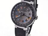a close up of a wrist watch with a black strap