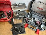 many different tools in a case on the floor