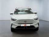 the front view of a white car in a white room