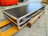 a large metal case sitting on top of a pallet