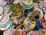 a lot of buttons that are on a table