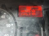 a close up of a car dashboard with a speedometer