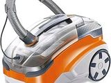 an orange and white vacuum cleaner on a white background