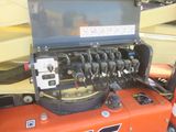 an image of a close up of the engine of a tractor
