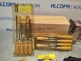 a lot of tools that are sitting on a table