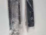 a remote control and a plastic bag on the table