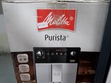 emballage d'une machine à café exposée dans un magasin
