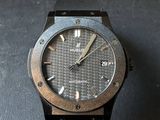 a close up of a watch on a table