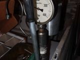 a picture of a close up of a gauge on a table