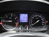 a close up of a car dashboard with various gauges