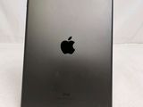 an apple ipad is sitting on a table with a white background