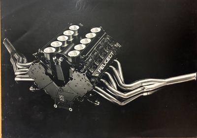 a black and white photo of a v8 engine
