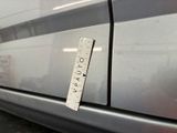 a sticker on the side of a car that says caution