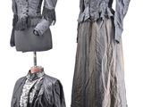 three different views of a woman ' s dress and jacket on a mannequin stand