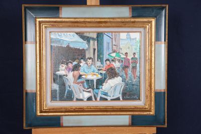 une peinture représentant un groupe de personnes assises à une table