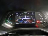 the dashboard of a car with a digital display on it